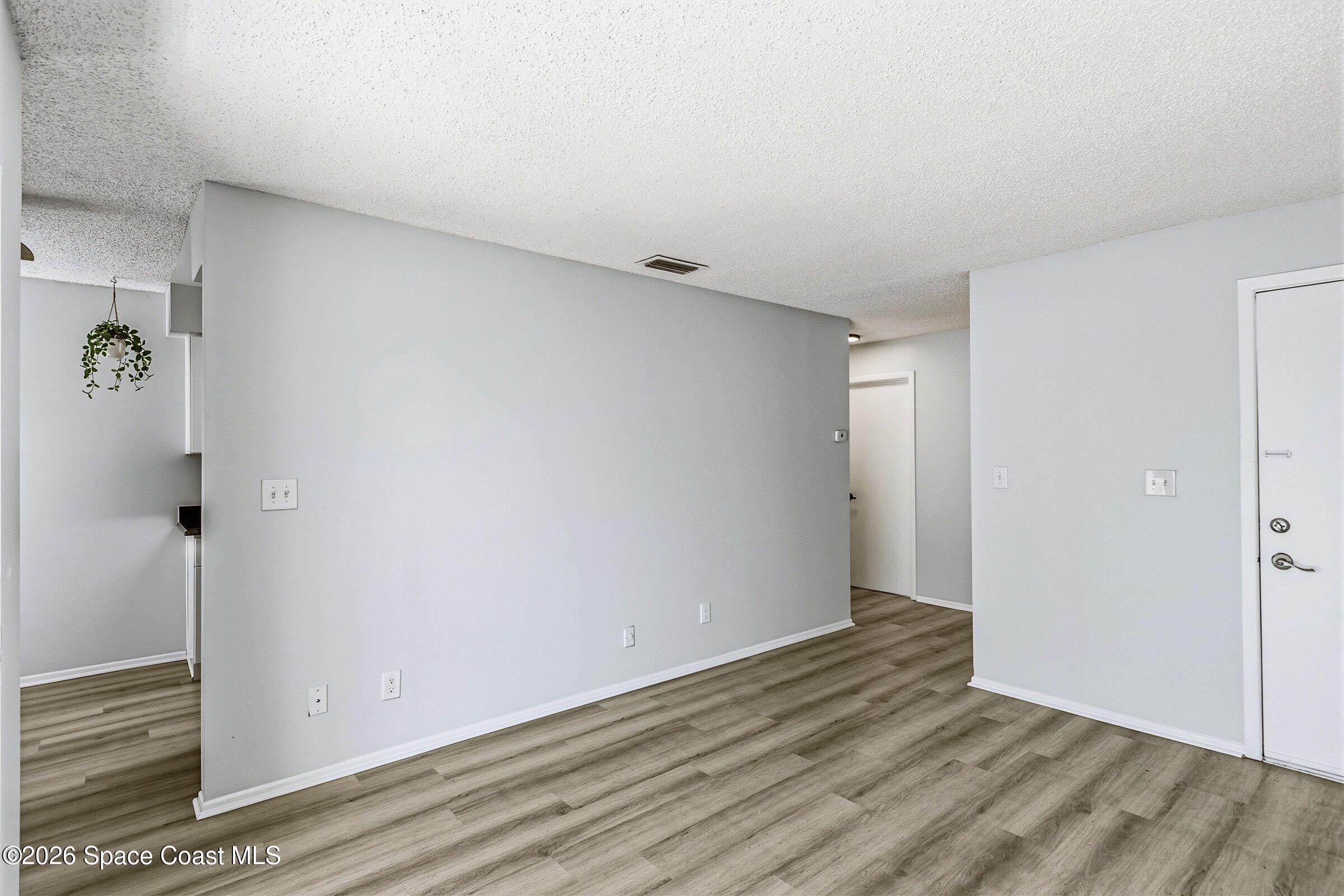 1225 North Wickham Road, Unit 223 Melbourne, FL 32935 - Photo 11 of 26 a view of an empty room