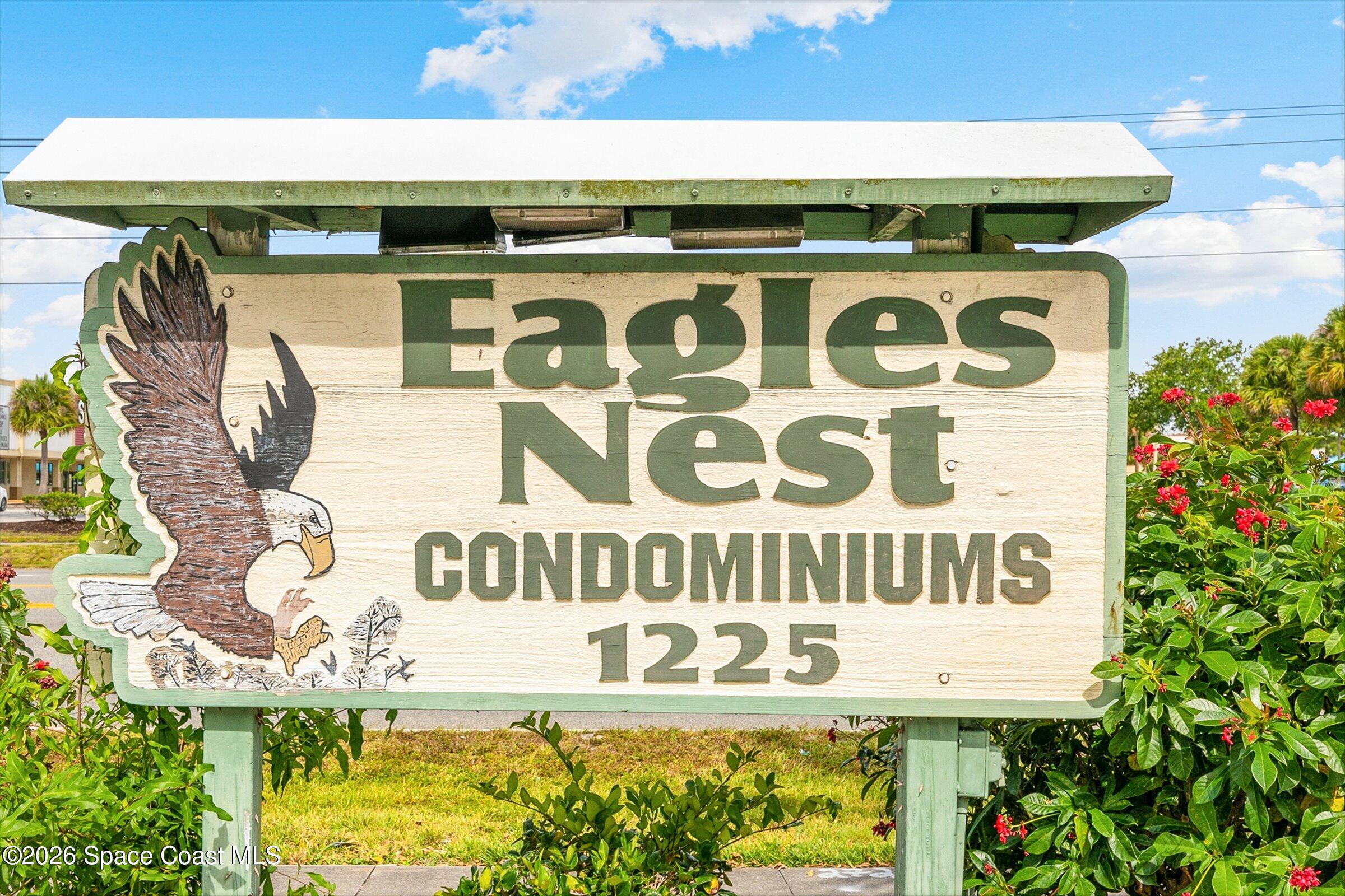 1225 North Wickham Road, Unit 223 Melbourne, FL 32935 - Photo 2 of 26 a sign that is on the wall