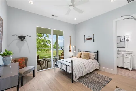 a bedroom with a bed and a couch