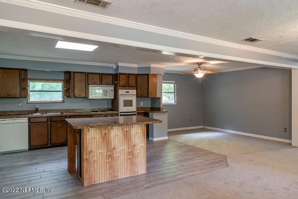 6152 Firestone Road Jacksonville, FL 32244 - Photo 16 of 37 Kitchen to Dining Area