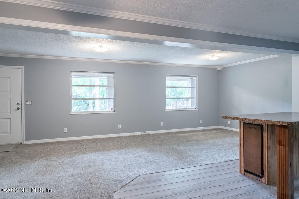 6152 Firestone Road Jacksonville, FL 32244 - Photo 10 of 37 Dining Area to Living Room