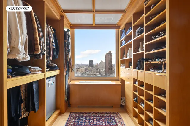 a bathroom with a tub and a window