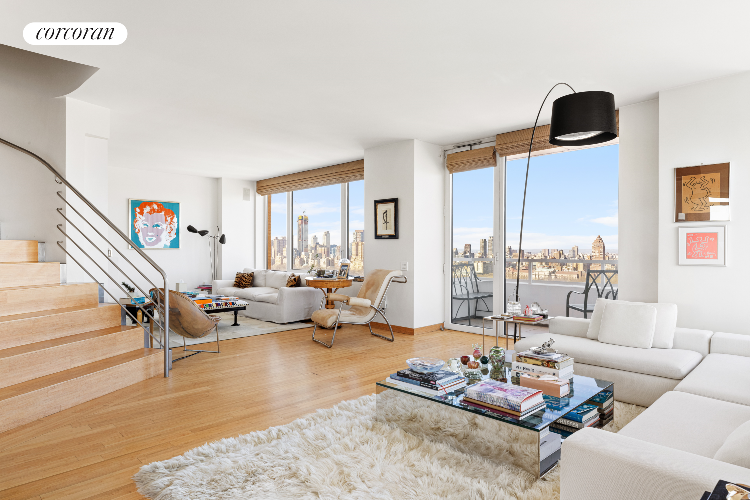 30 East 85th Street, Unit 26/27B Manhattan, NY 10028 - Photo 6 of 25 a living room with furniture and floor to ceiling windows