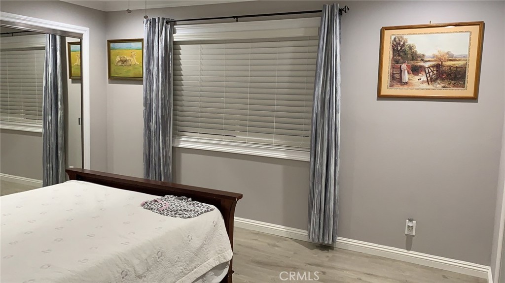 509 West Duarte Road, Unit B Monrovia, CA 91016 - Photo 12 of 20 a bedroom with a bed and a window
