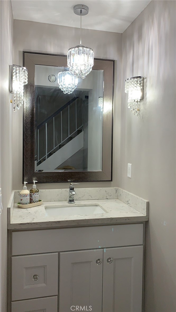 509 West Duarte Road, Unit B Monrovia, CA 91016 - Photo 8 of 20 a bathroom with a sink and a mirror