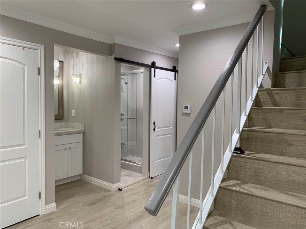 509 West Duarte Road, Unit B Monrovia, CA 91016 - Photo 10 of 20 a view of an entryway with wooden floor and staircase