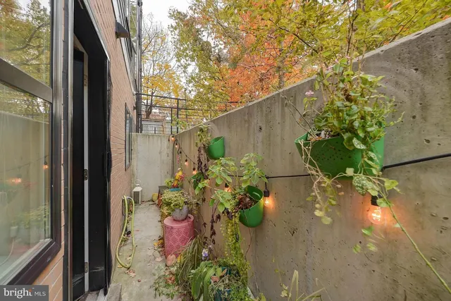 a view of a terrace with seating area