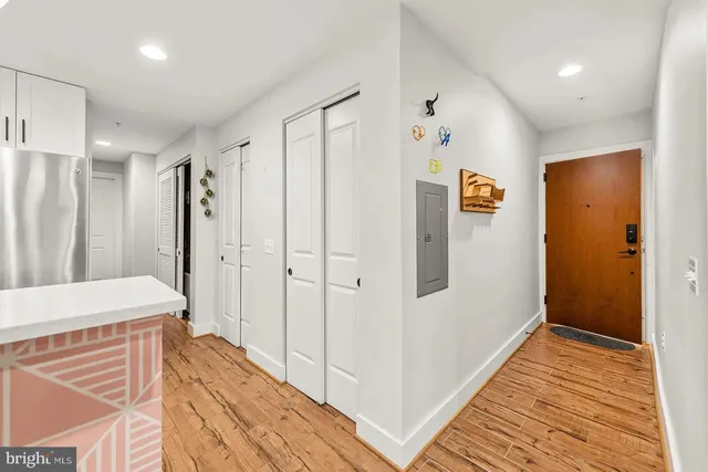 a bathroom with a sink a mirror and a shower