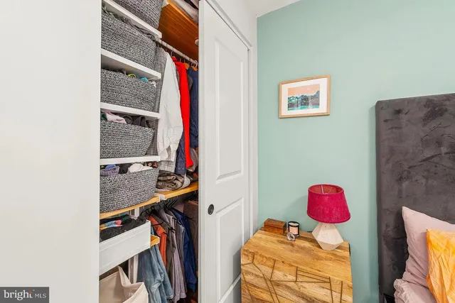 a bathroom with a sink a toilet and a shower