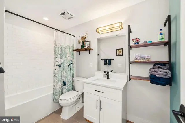 a workspace with furniture and wooden floor