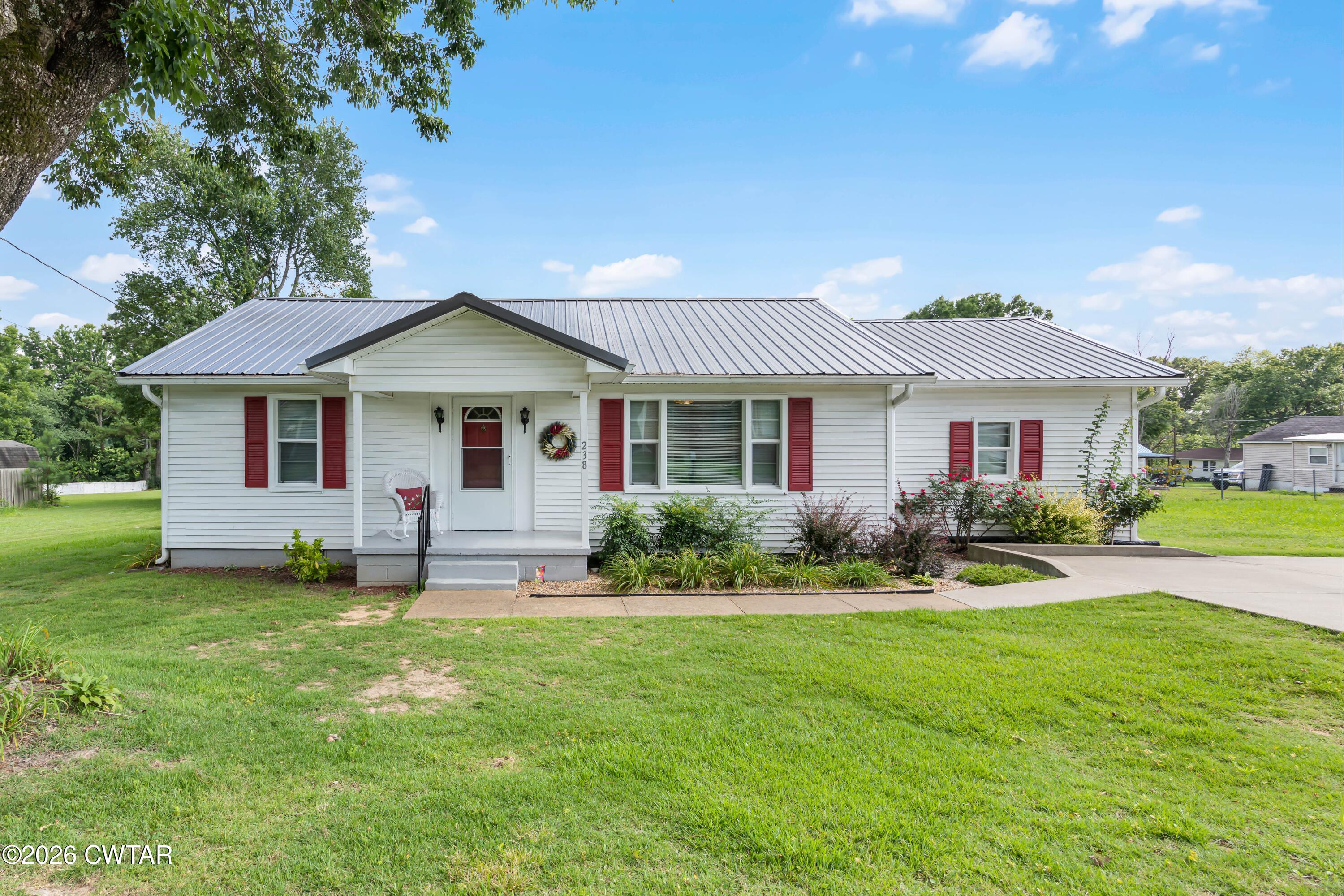 238 Holmes Street Trezevant, TN 38258 - Photo 1 of 25 Front