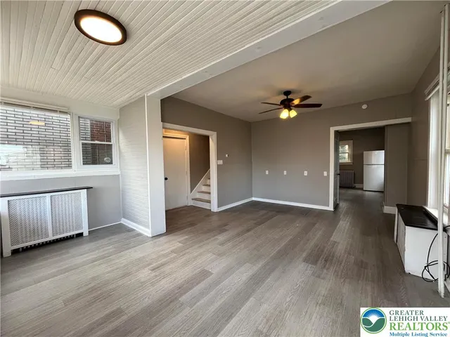 a view of an empty room and window