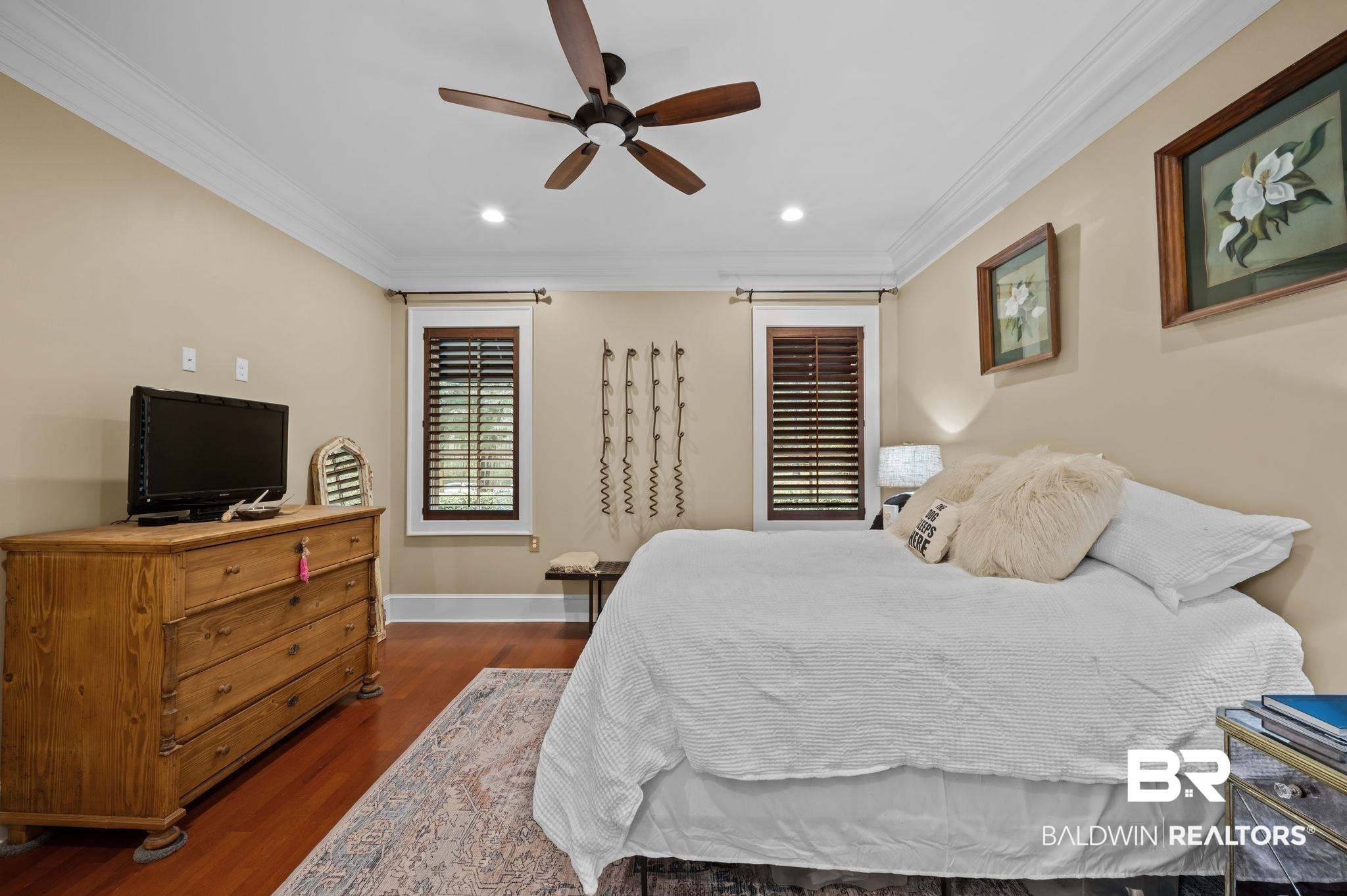 7850 Yorkhaven Road Mobile, AL 36695 - Photo 21 of 57 Bedroom with dark wood-style floors, recessed lighting, crown molding, and baseboards
