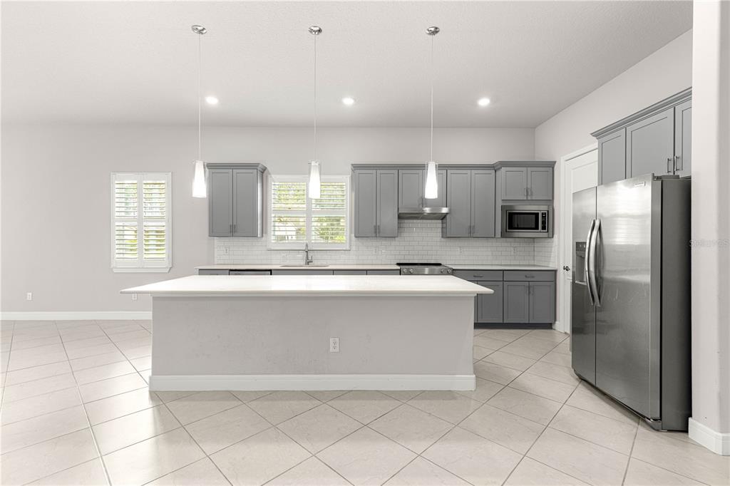 9147 Southwest 65th Loop Ocala, FL 34481 - Photo 5 of 58