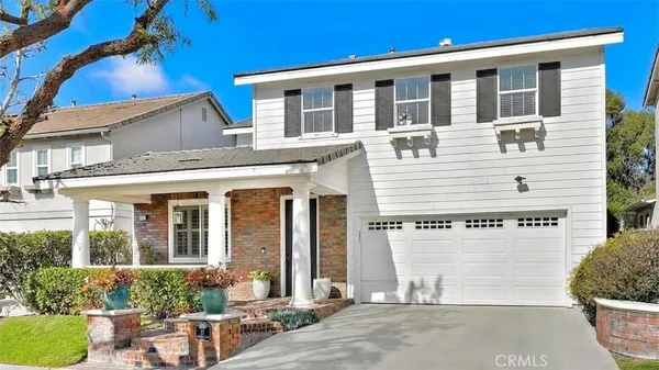 a front view of a house with outdoor space