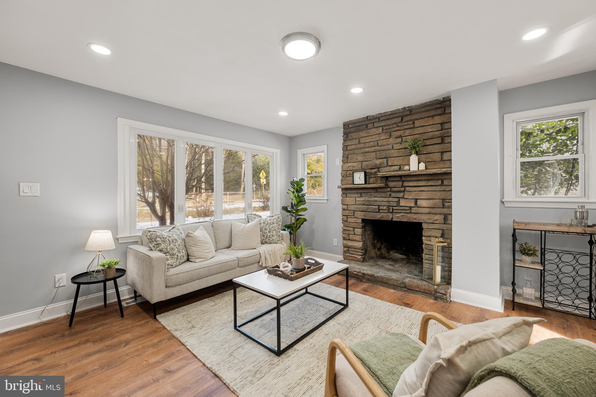 6439 Bock Road Oxon Hill, MD 20745 - Photo 12 of 38 a living room with furniture and a fireplace