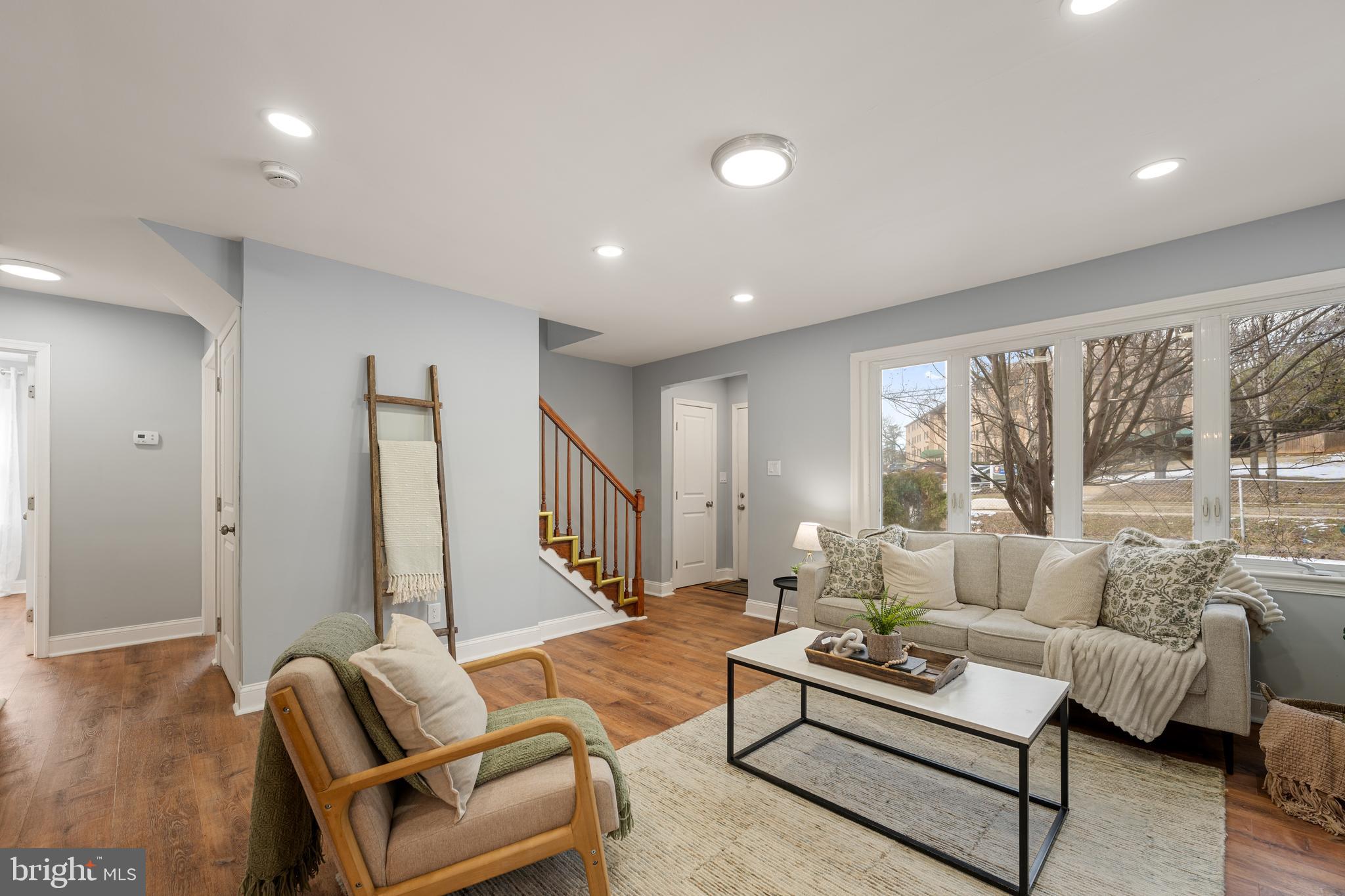 6439 Bock Road Oxon Hill, MD 20745 - Photo 14 of 38 a living room with furniture and a large window