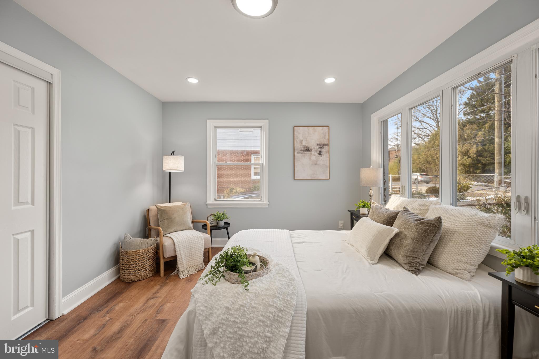 6439 Bock Road Oxon Hill, MD 20745 - Photo 16 of 38 a bedroom with furniture and a large window