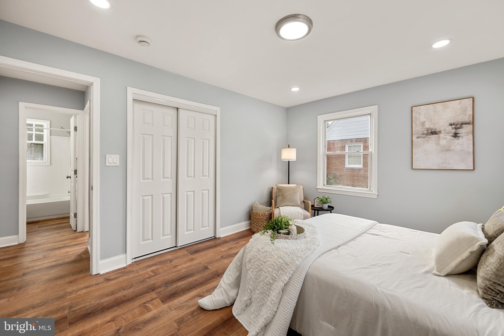 6439 Bock Road Oxon Hill, MD 20745 - Photo 17 of 38 a bedroom with a bed and a window