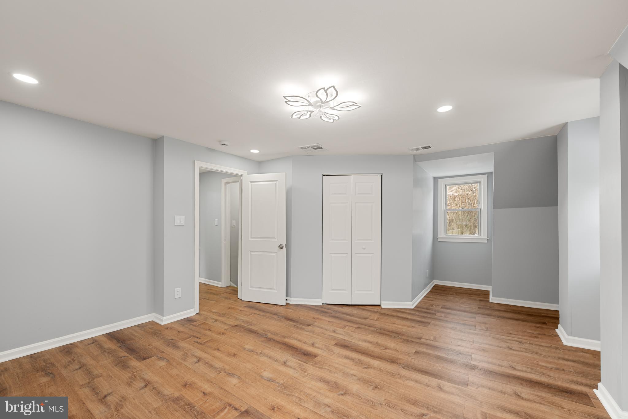 6439 Bock Road Oxon Hill, MD 20745 - Photo 23 of 38 a view of empty room with wooden floor