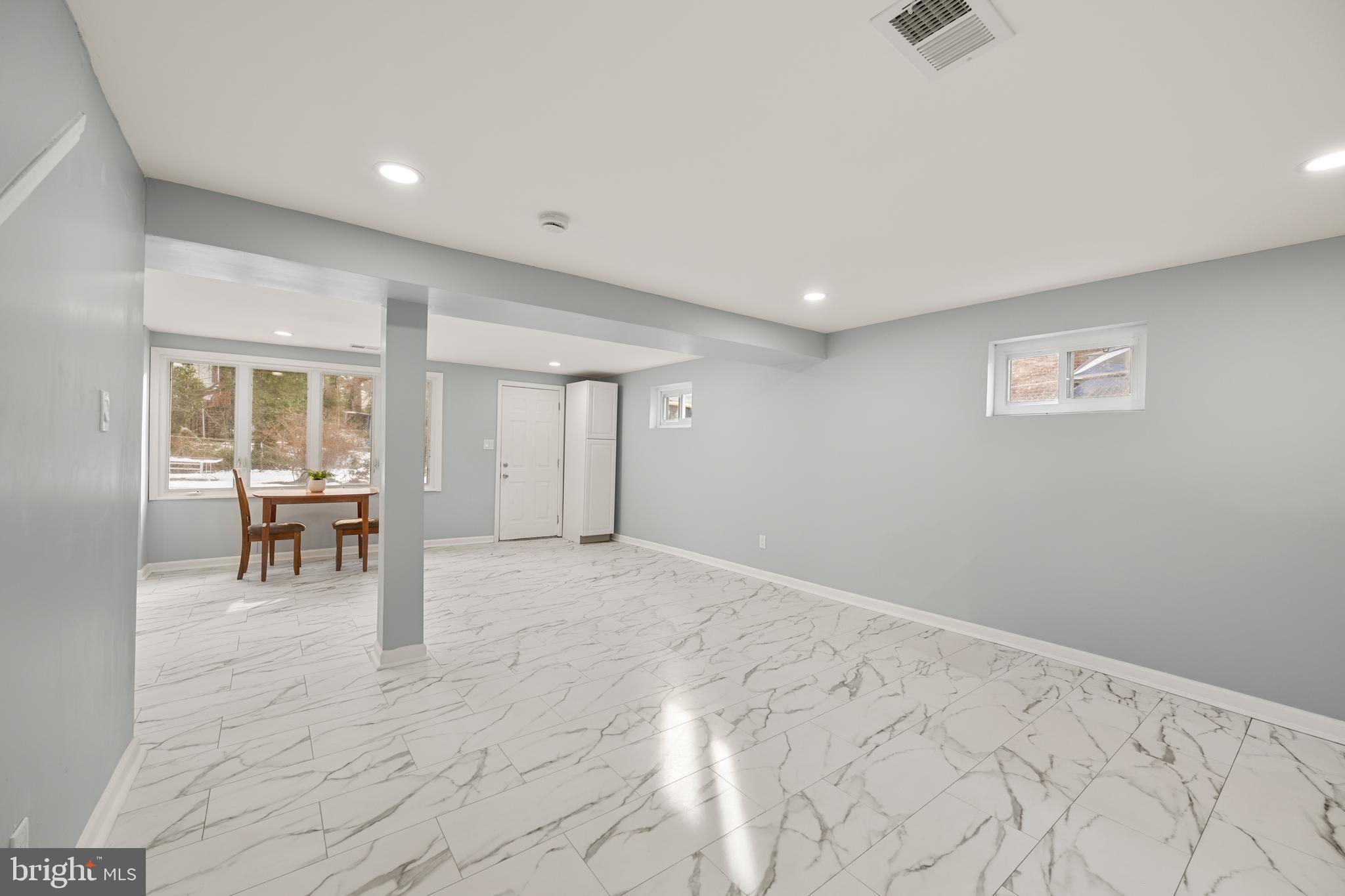 6439 Bock Road Oxon Hill, MD 20745 - Photo 26 of 38 a view of livingroom with furniture and lounge chair