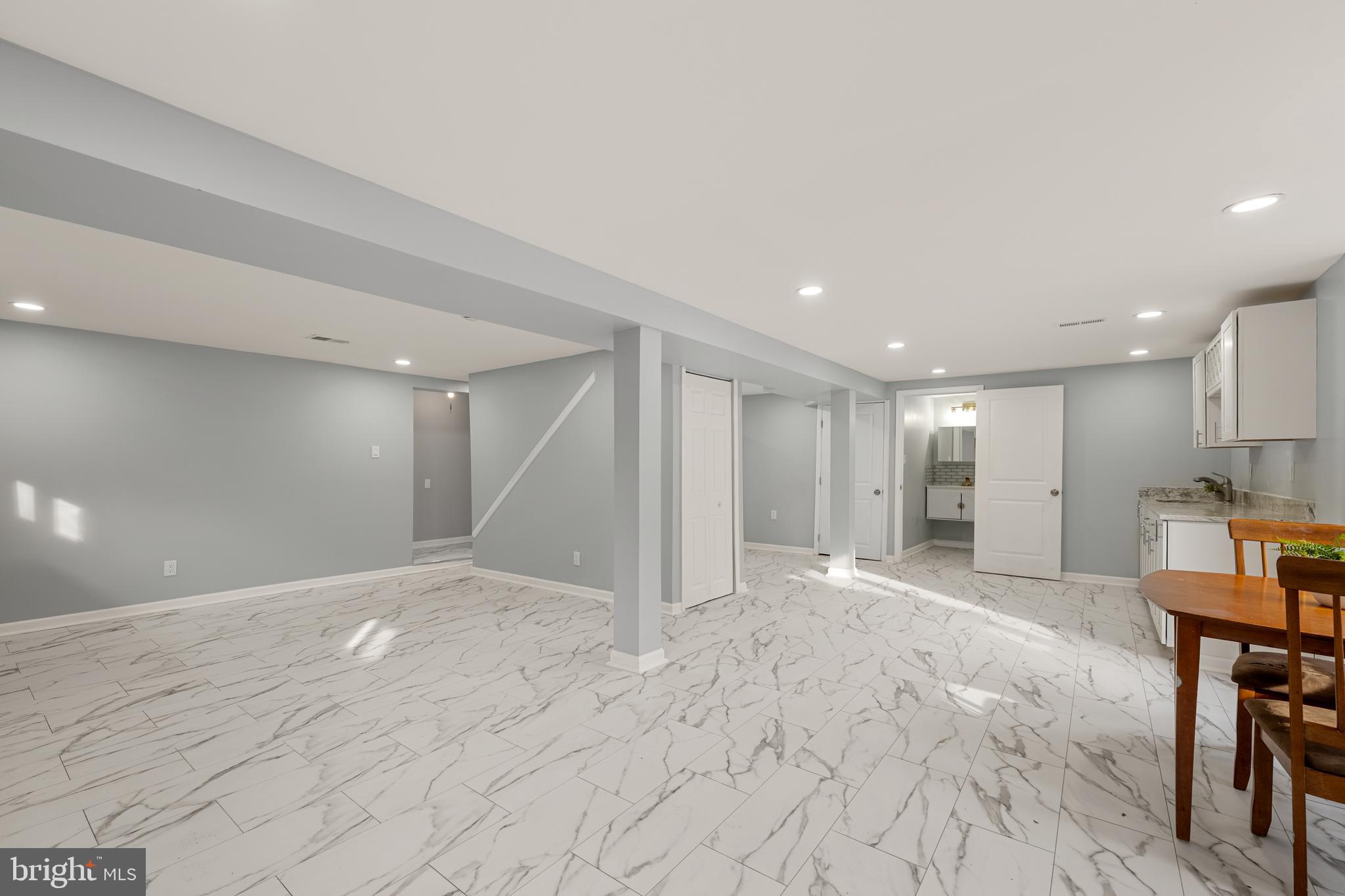6439 Bock Road Oxon Hill, MD 20745 - Photo 28 of 38 a view of a big room with wooden cabinet and windows
