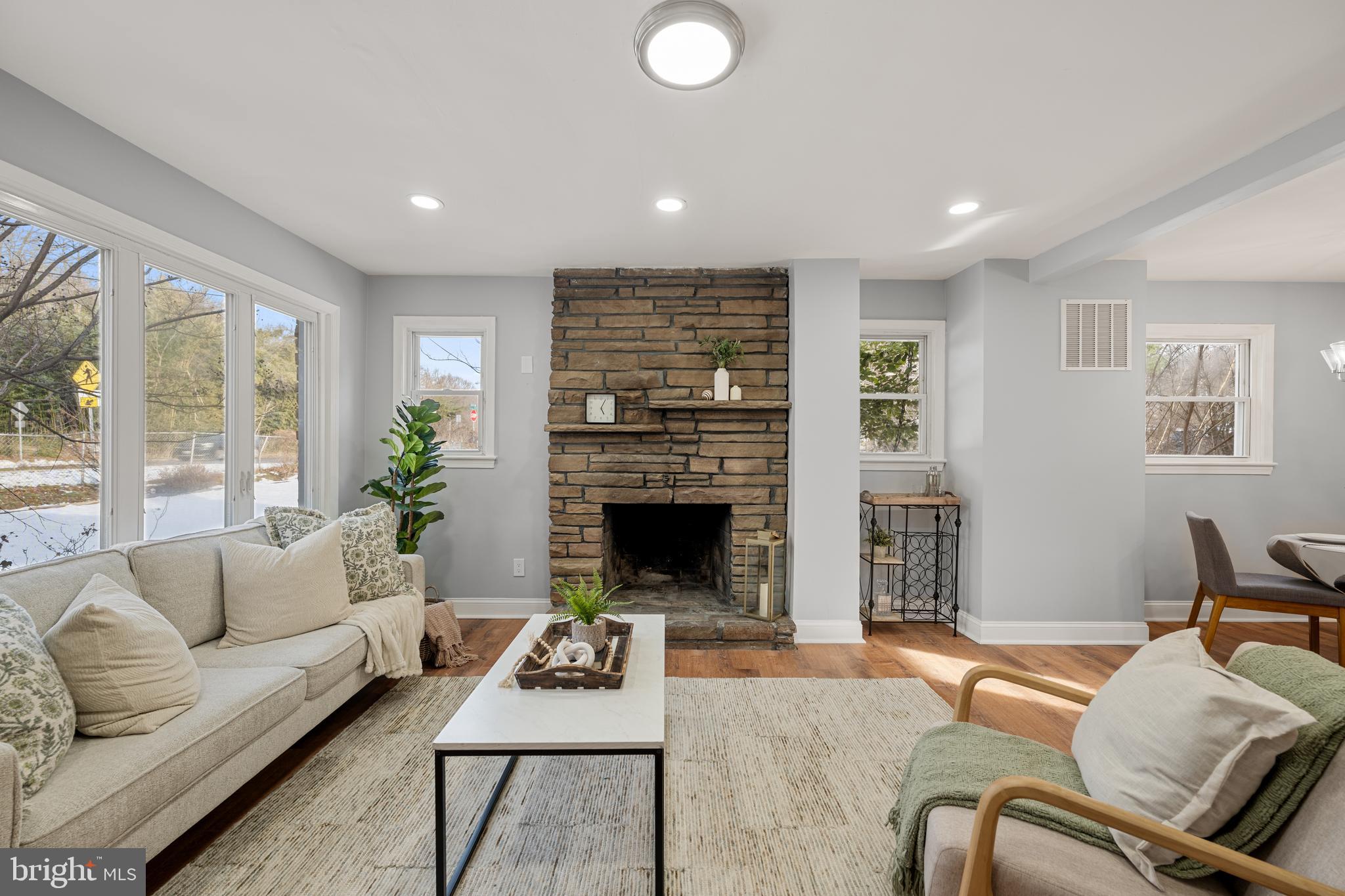 6439 Bock Road Oxon Hill, MD 20745 - Photo 3 of 38 a living room with furniture and a fireplace