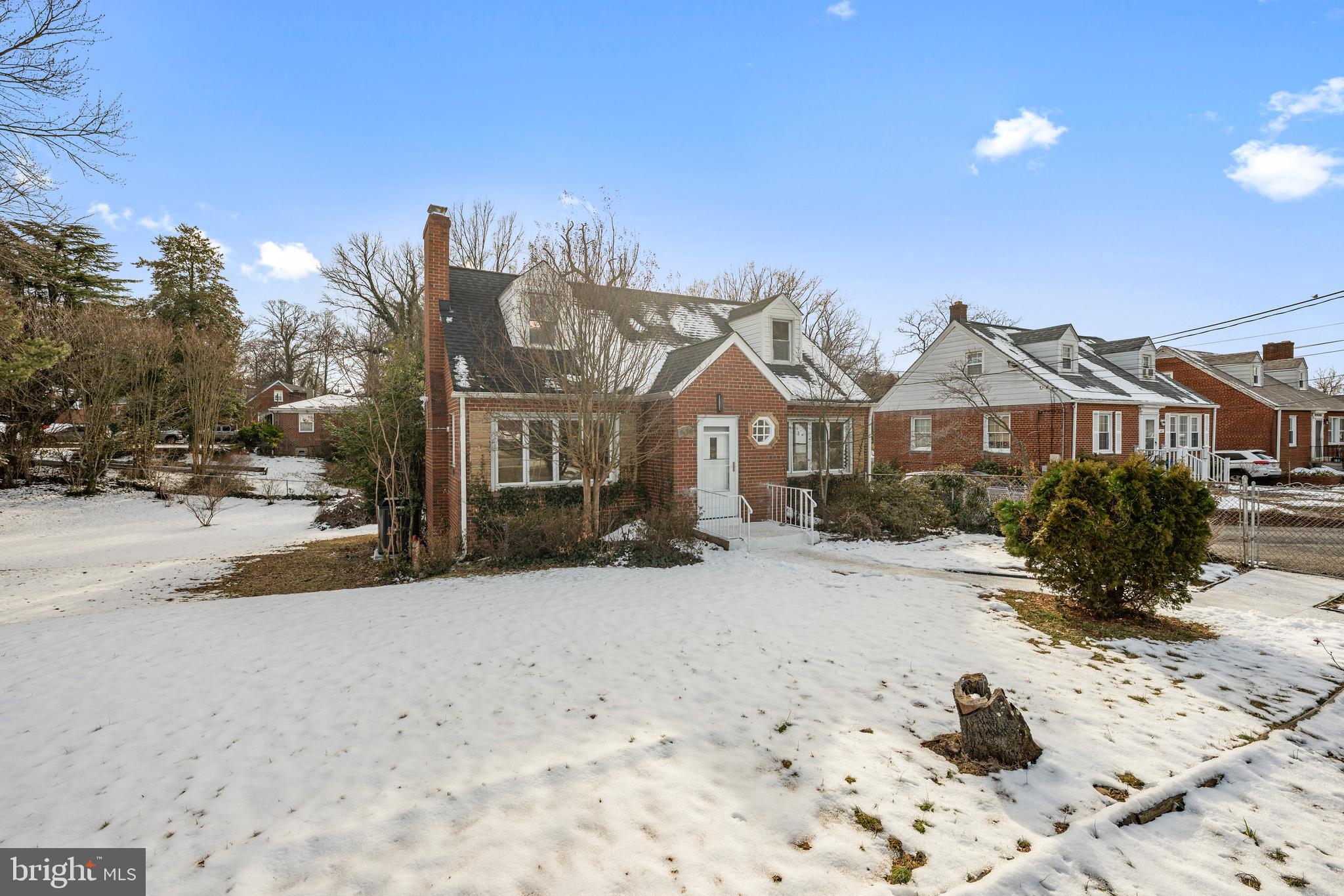6439 Bock Road Oxon Hill, MD 20745 - Photo 36 of 38 a view of a house with a snow in the middle of a yard
