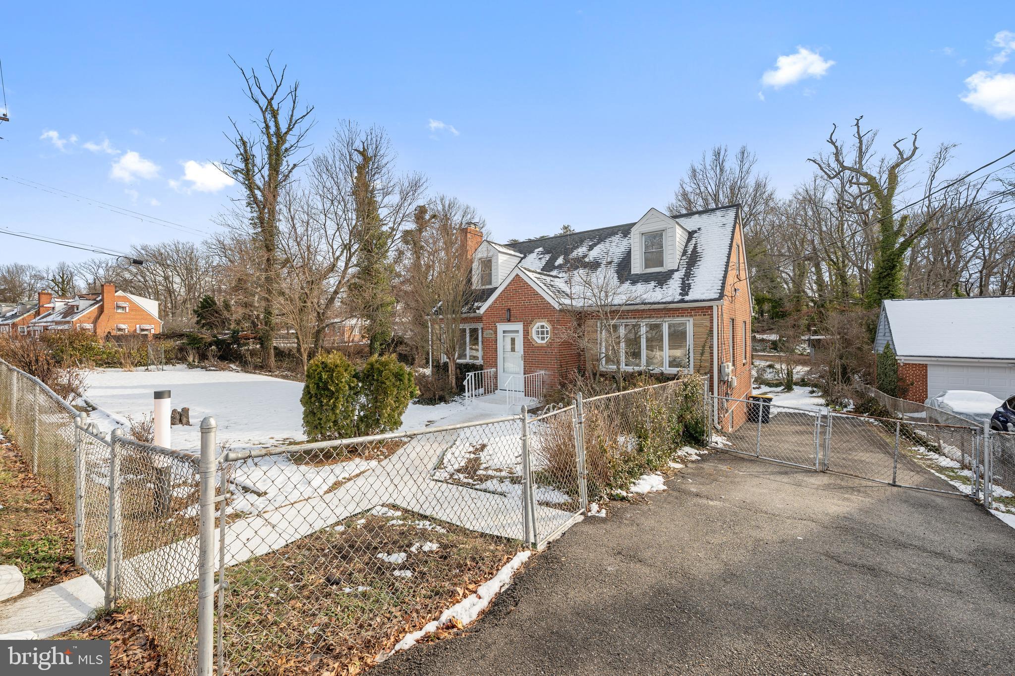 6439 Bock Road Oxon Hill, MD 20745 - Photo 37 of 38 a view of a house with a yard and sitting area
