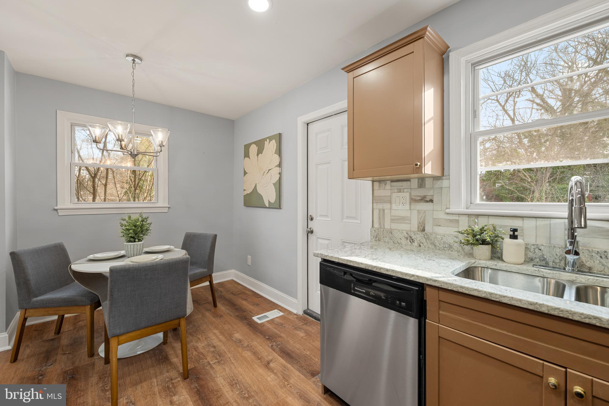 6439 Bock Road Oxon Hill, MD 20745 - Photo 8 of 38 a view of a kitchen area with furniture and window