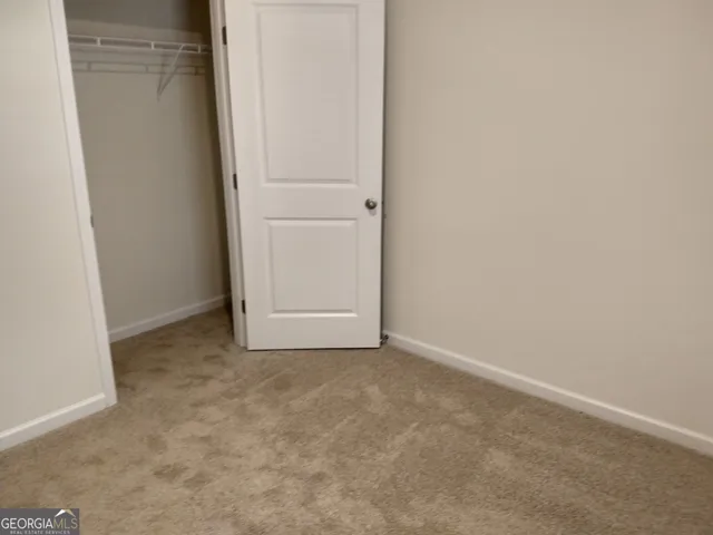 an empty room with closet
