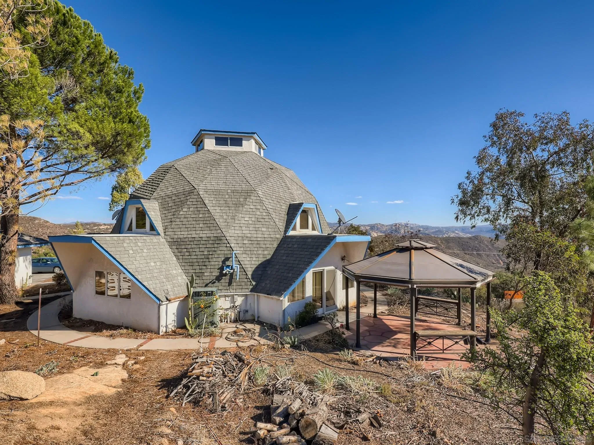 20509 Bexley Road Jamul, CA 91935 - Photo 1 of 28 a front view of a house with a yard