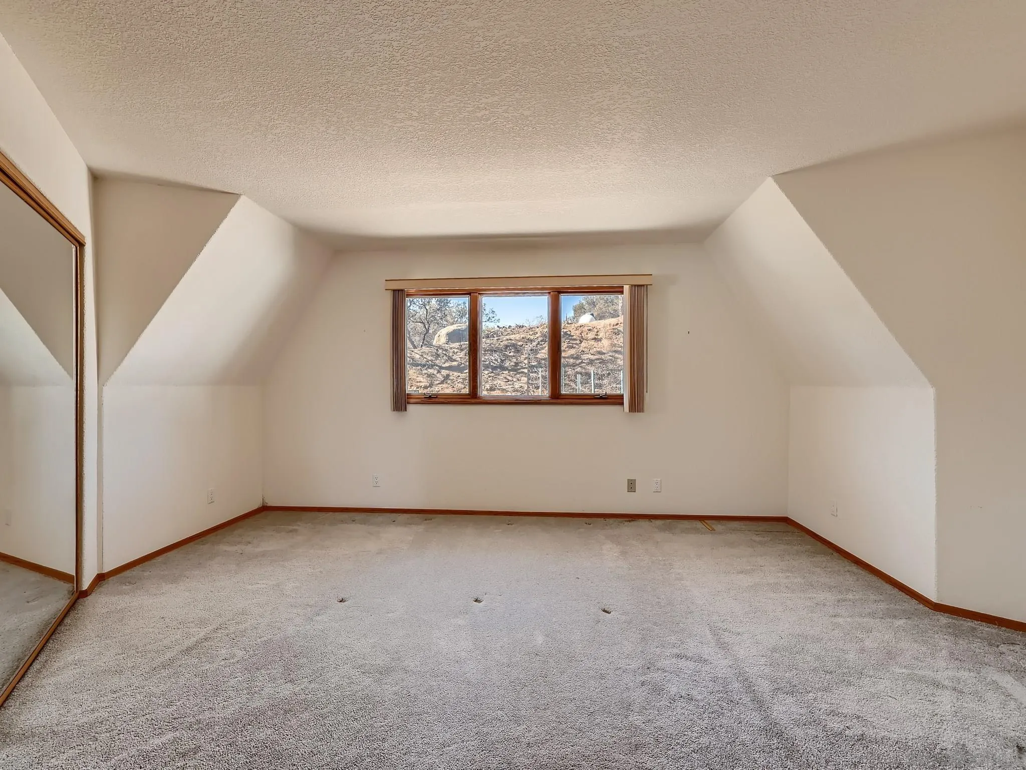20509 Bexley Road Jamul, CA 91935 - Photo 12 of 28 an empty room with windows