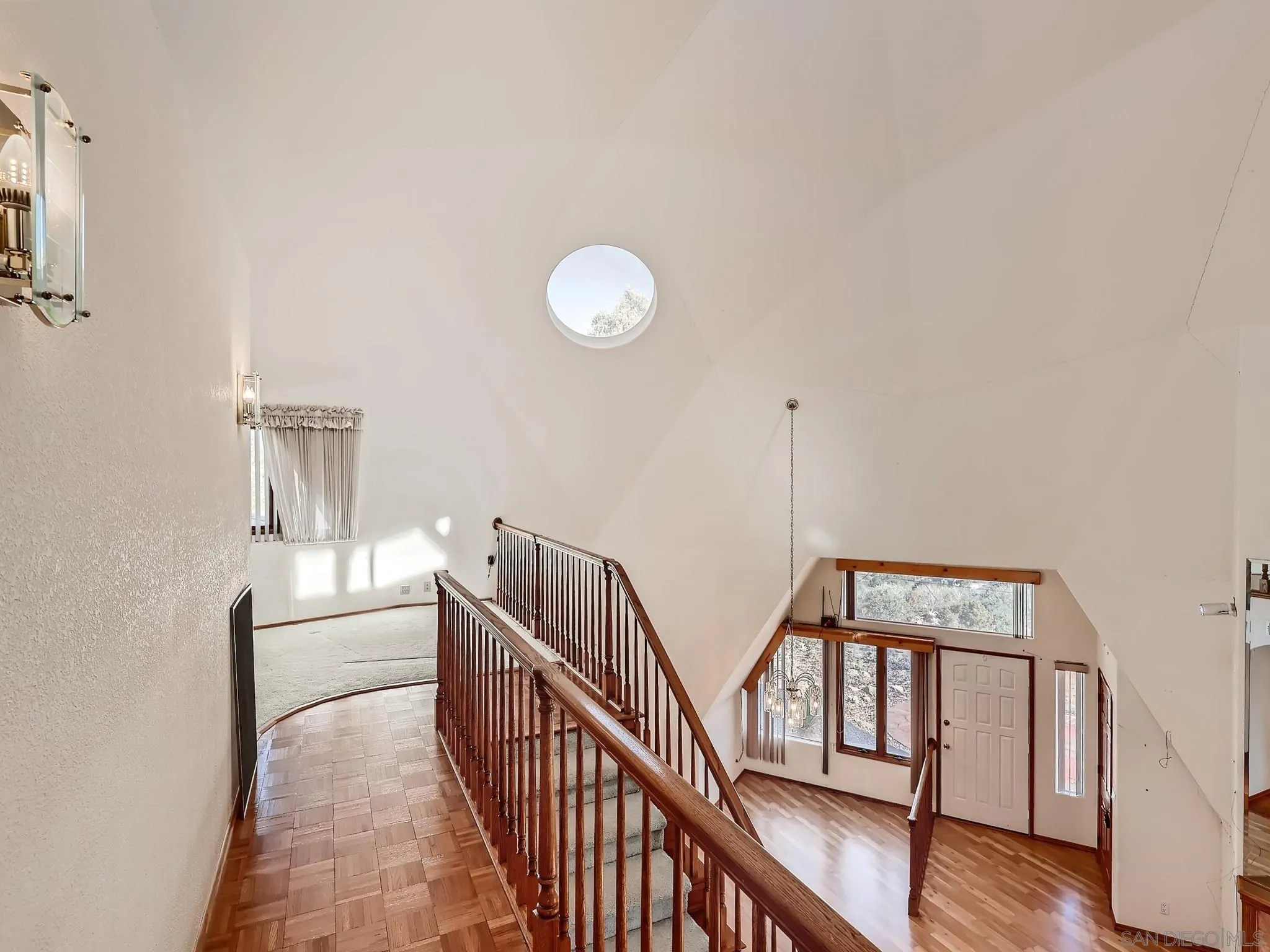 20509 Bexley Road Jamul, CA 91935 - Photo 17 of 28 a view of staircase with railing and white walls