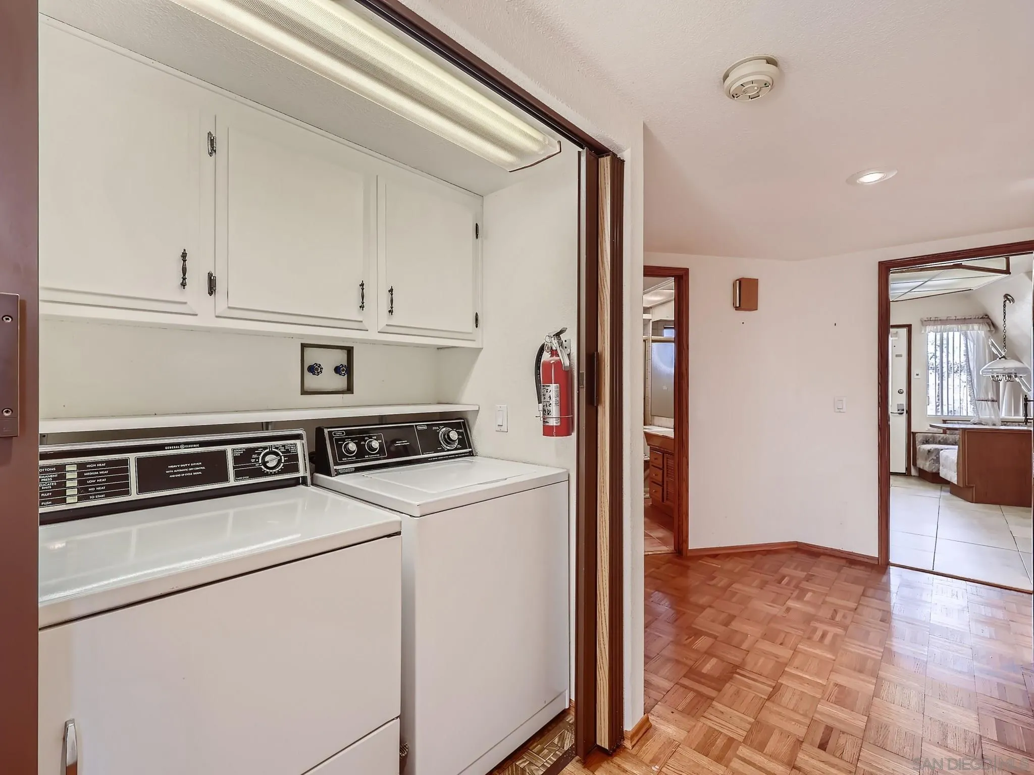 20509 Bexley Road Jamul, CA 91935 - Photo 19 of 28 a kitchen with cabinets and appliances