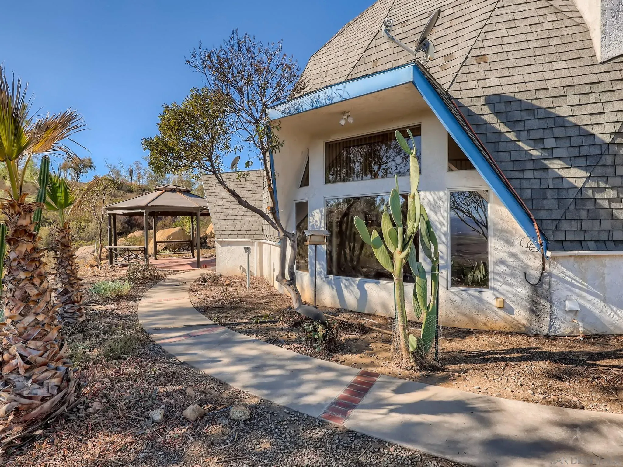 20509 Bexley Road Jamul, CA 91935 - Photo 20 of 28 a front view of a house with a yard