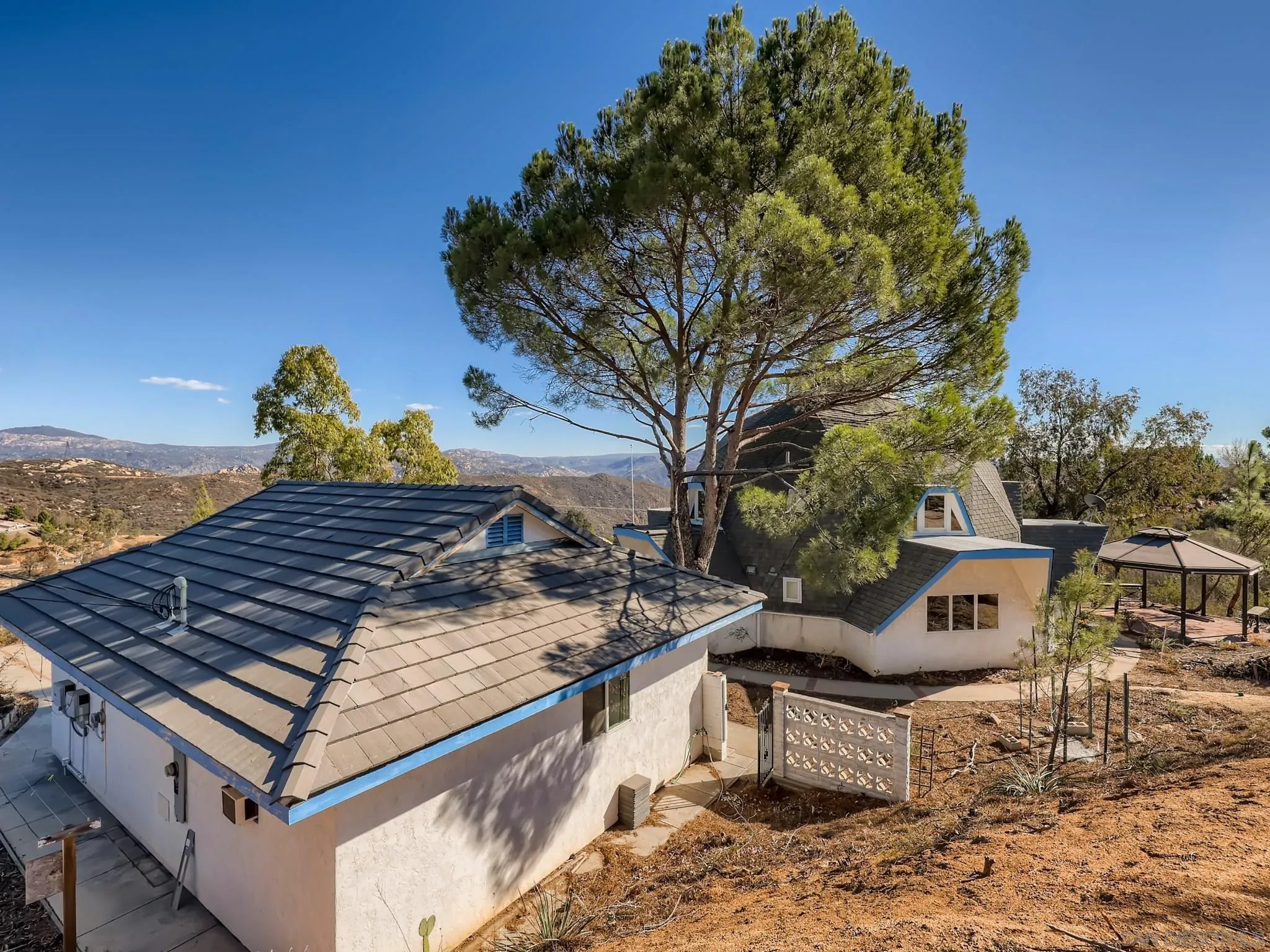 20509 Bexley Road Jamul, CA 91935 - Photo 2 of 28 a view of a two chairs in the roof deck