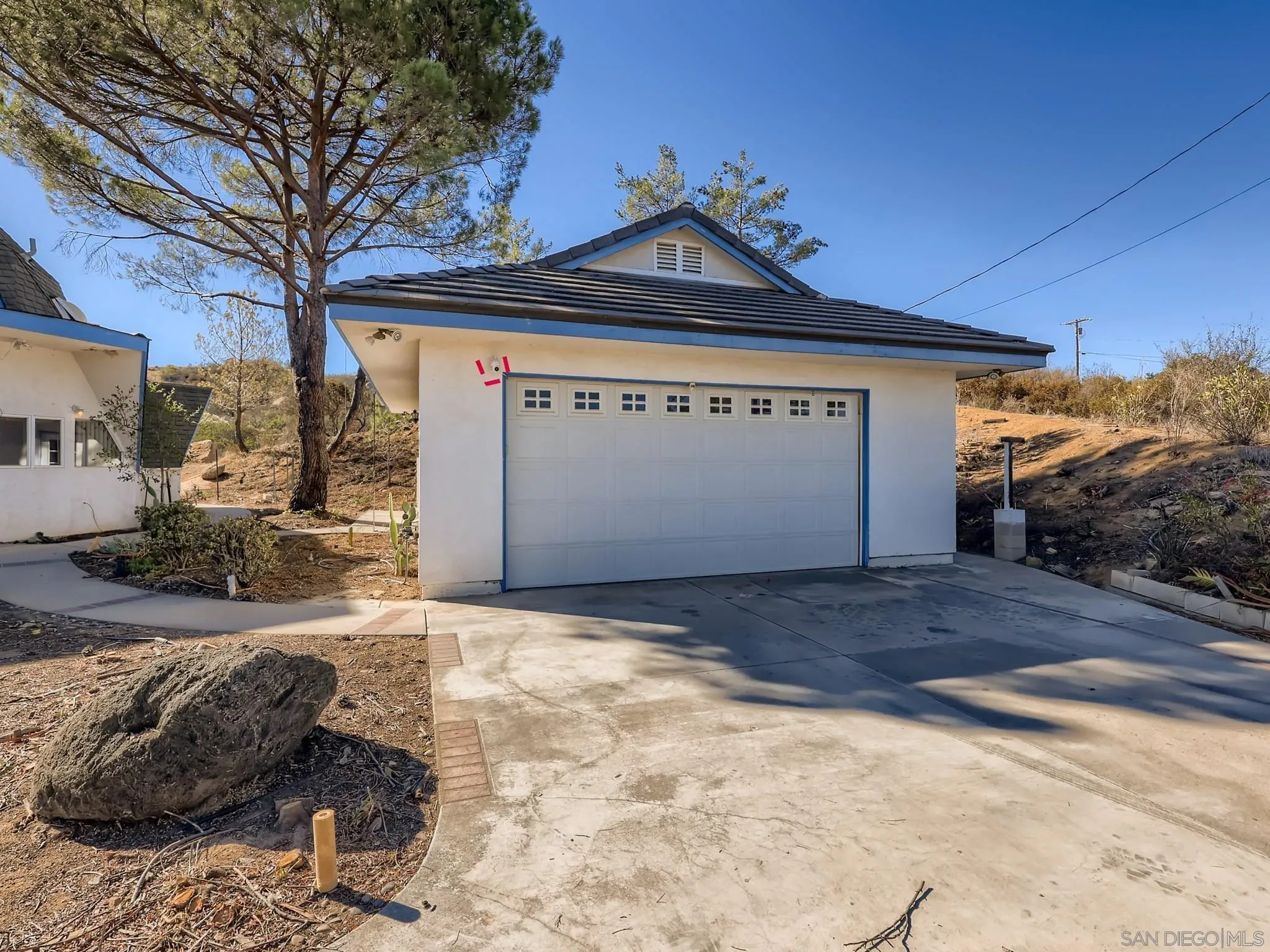 20509 Bexley Road Jamul, CA 91935 - Photo 23 of 28 a front view of a house with a yard