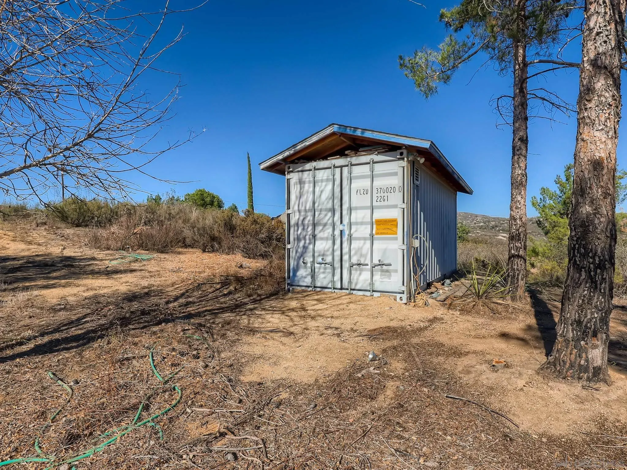 20509 Bexley Road Jamul, CA 91935 - Photo 28 of 28 a view of a house with a yard