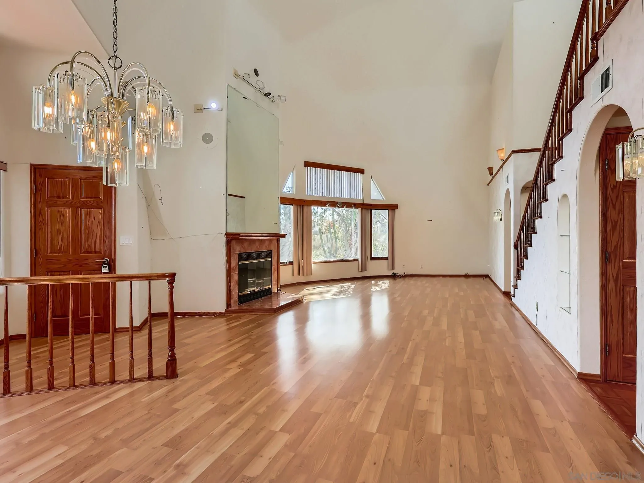 20509 Bexley Road Jamul, CA 91935 - Photo 6 of 28 a view of empty room with wooden floor and fan