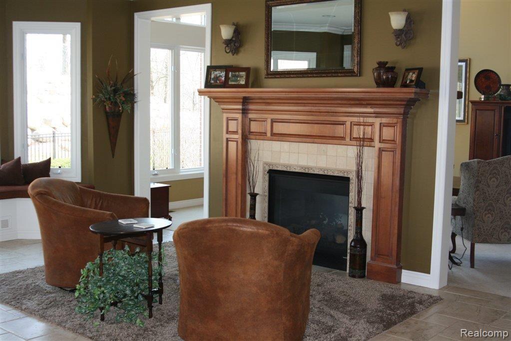 870 Quarry Drive Rochester, MI 48306 - Photo 7 of 25 Kitchen Fireplace.JPG