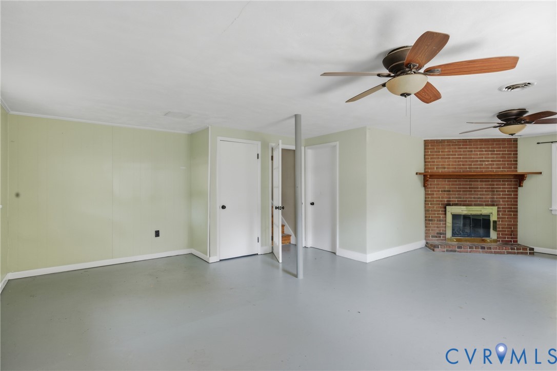 8210 Ireton Road Henrico, VA 23228 - Photo 11 of 36 a view of an empty room with a fireplace