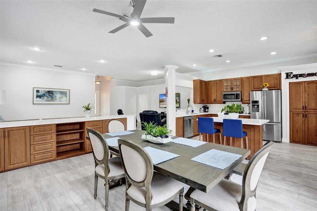 13129 Southwest 32nd Street Miramar, FL 33027 - Photo 17 of 38 a view of a dining room with furniture