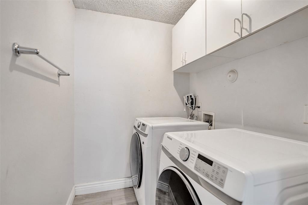 13129 Southwest 32nd Street Miramar, FL 33027 - Photo 20 of 38 a utility room with dryer and washer