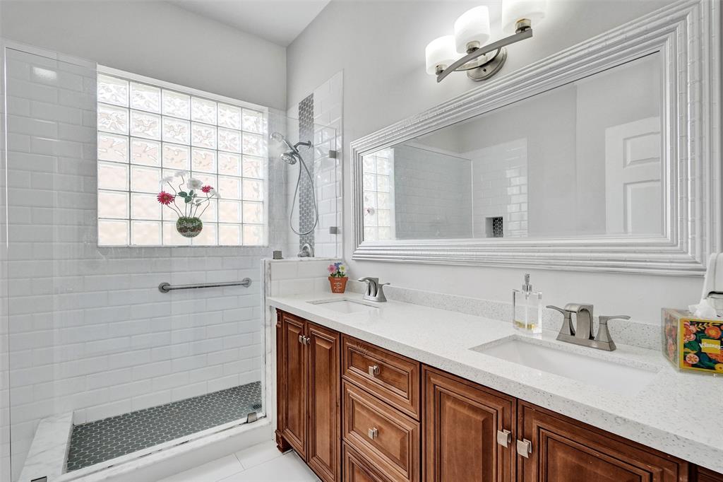 13129 Southwest 32nd Street Miramar, FL 33027 - Photo 24 of 38 a bathroom with a sink and a window