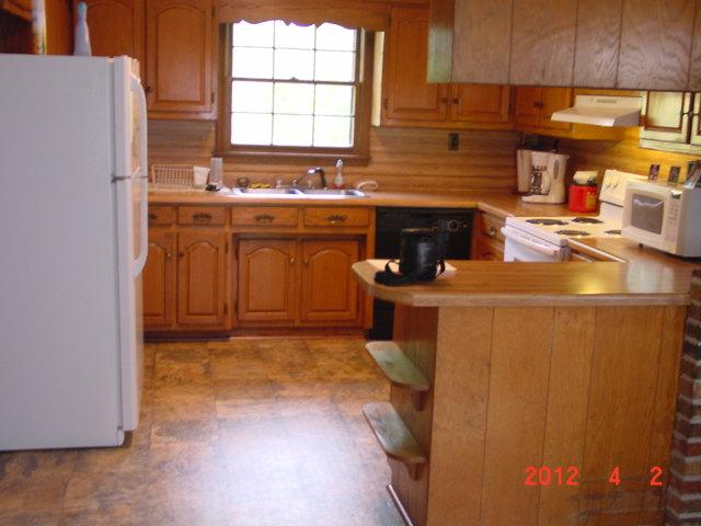 823 Pleasant Ridge Road Woodbury, TN 37190 - Photo 3 of 8 HAS LARGE EATING AREA WITH HEARTH FOR WOOD STOVE