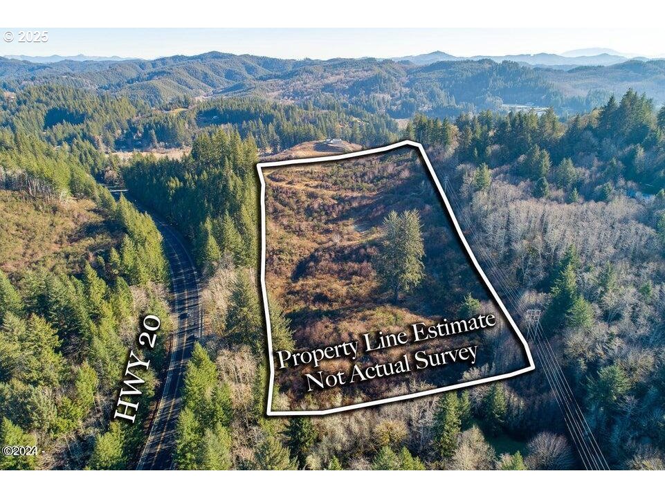 2303 Northeast Arcadia Drive, Unit 2303 Toledo, OR 97391 - Photo 9 of 18 a view of a sign that is on a street