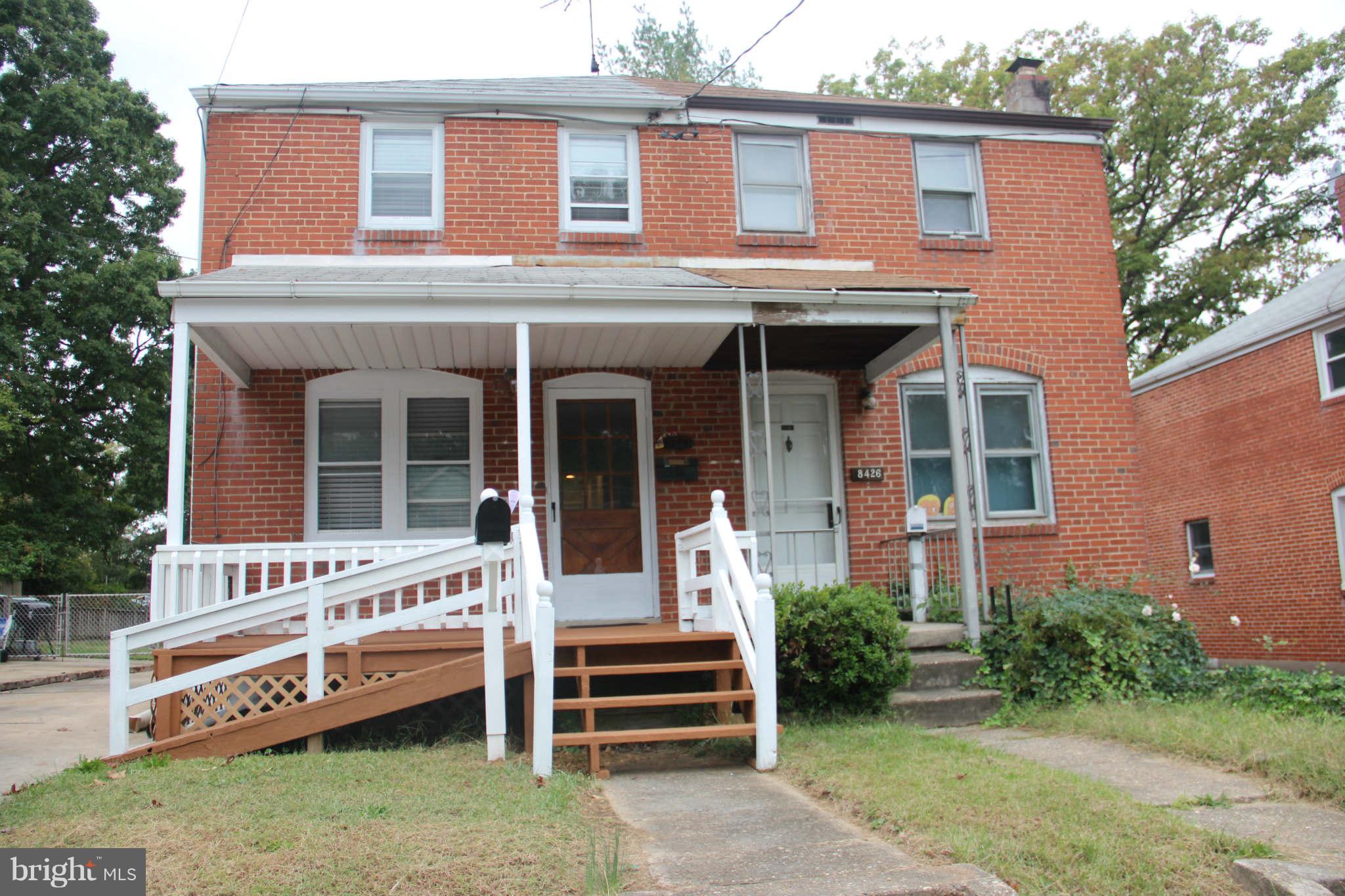 8424 Oakleigh Road Baltimore, MD 21234 - Photo 1 of 11 front view of a house with a yard