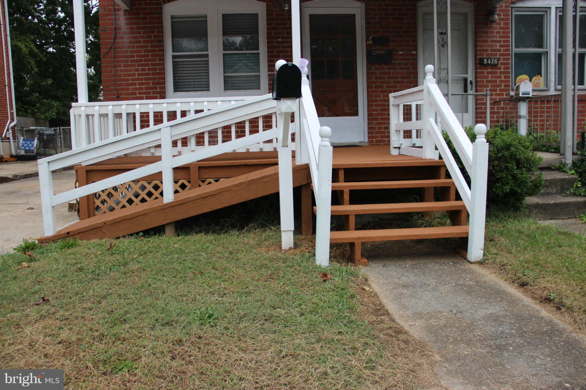 8424 Oakleigh Road Baltimore, MD 21234 - Photo 8 of 11 a view of a house with backyard and deck