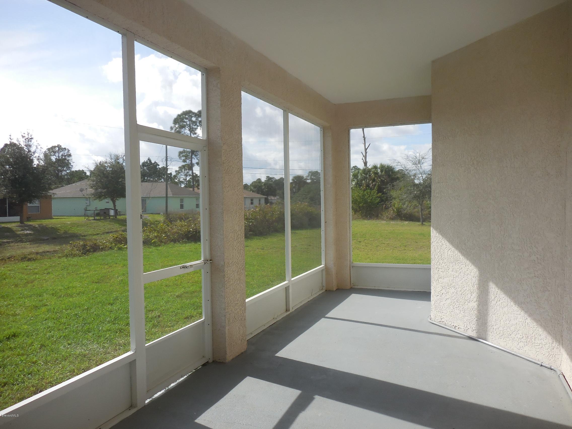 220 Gamewell Road Southwest Palm Bay, FL 32908 - Photo 18 of 19 sunny screened porch